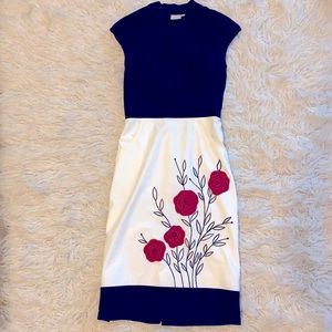 Adorable embroidered dress. Black, white, red